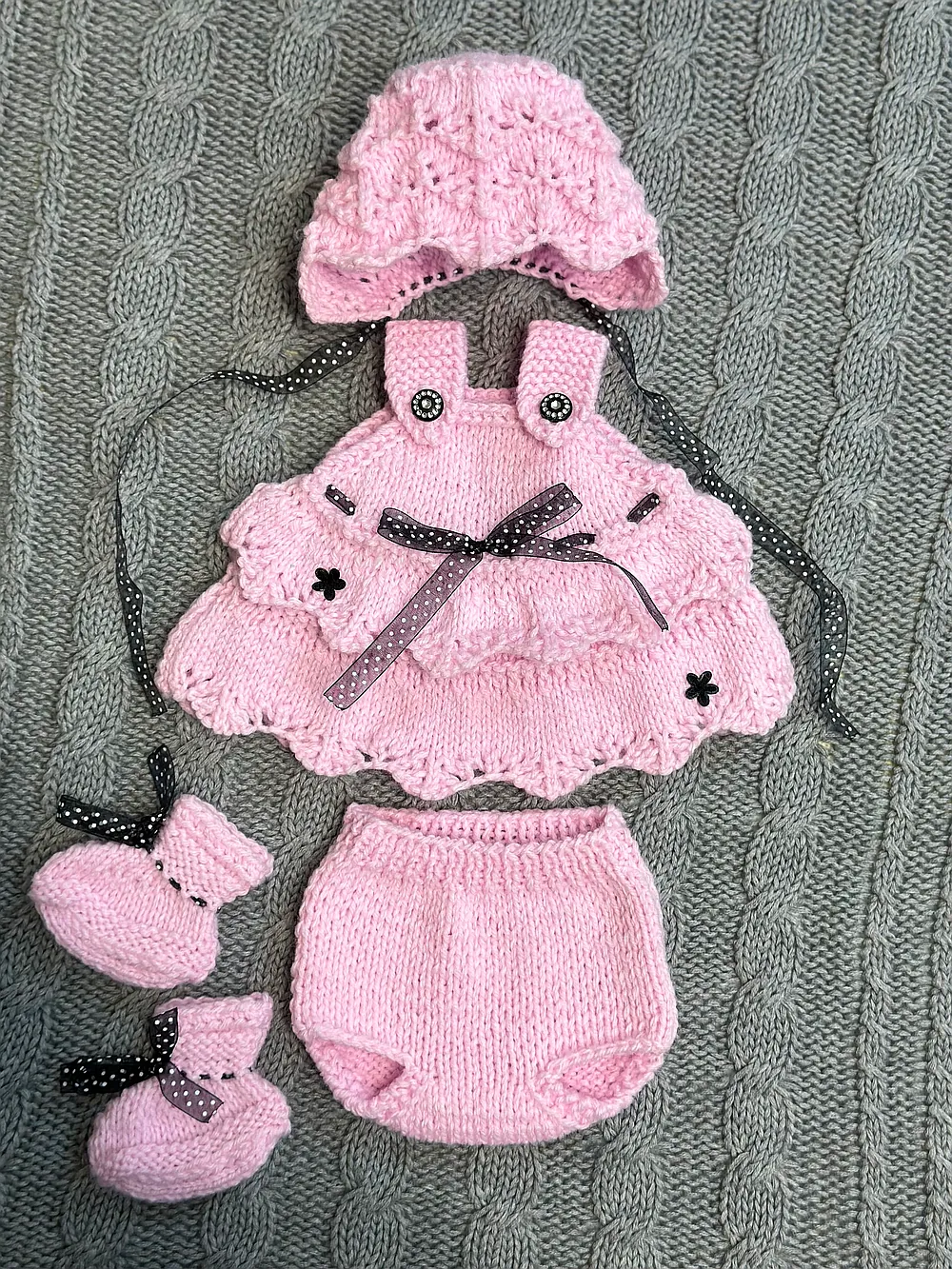Hand knitted outfit
