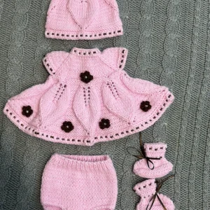 Hand knitted outfit