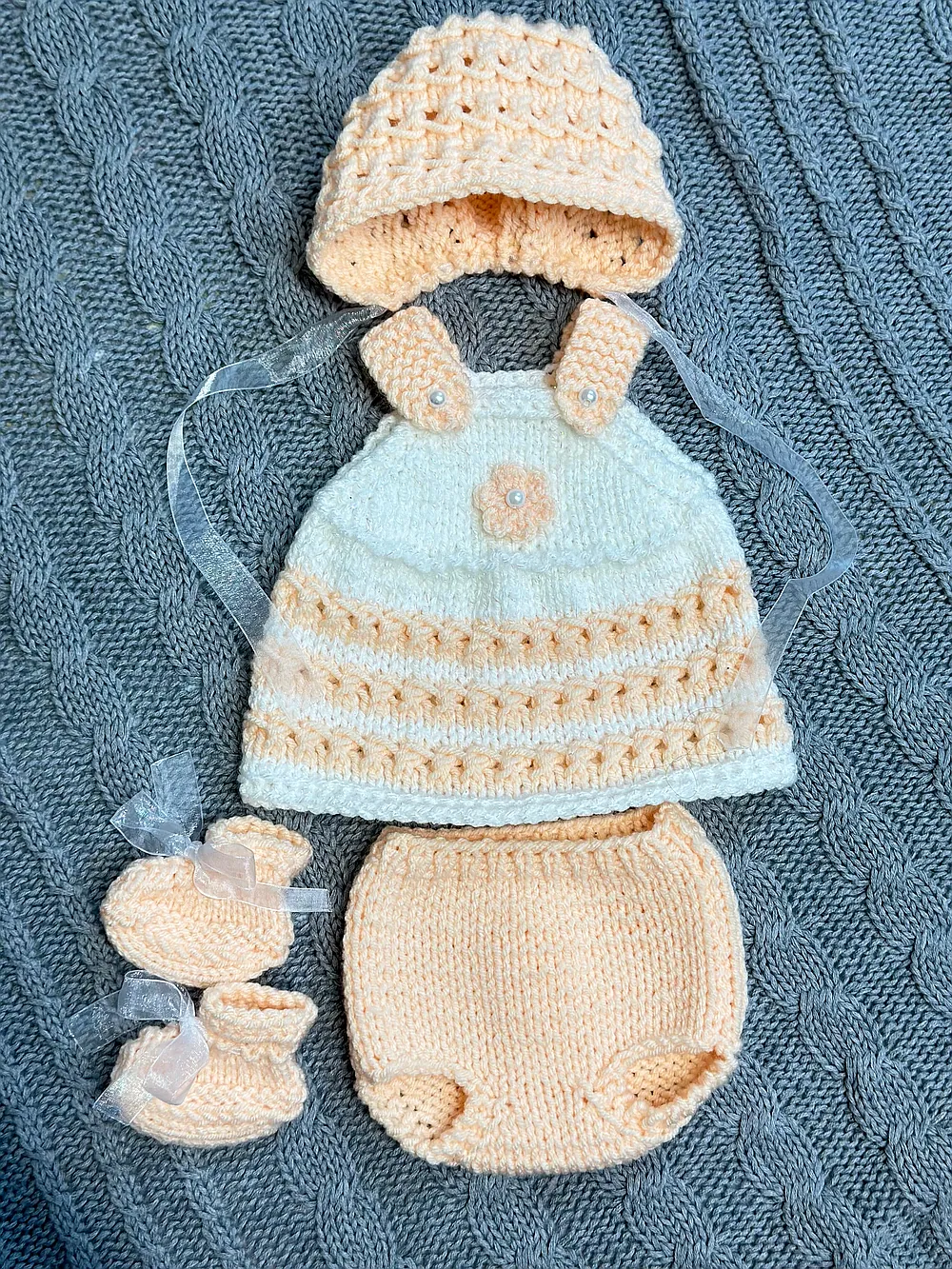 Hand knitted outfit